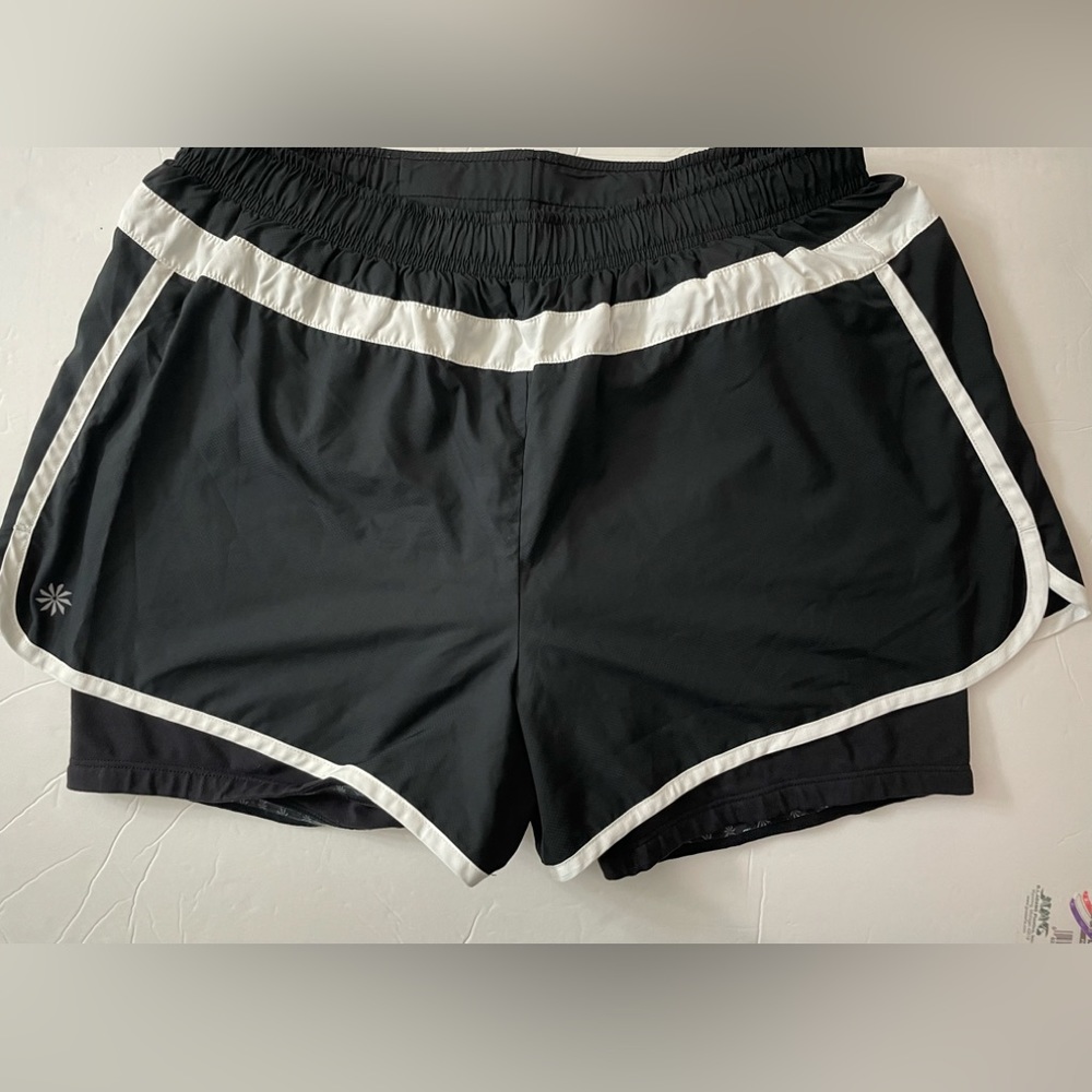 Athleta Hana 2 and 1 layered running shorts. Drawstring black size M.